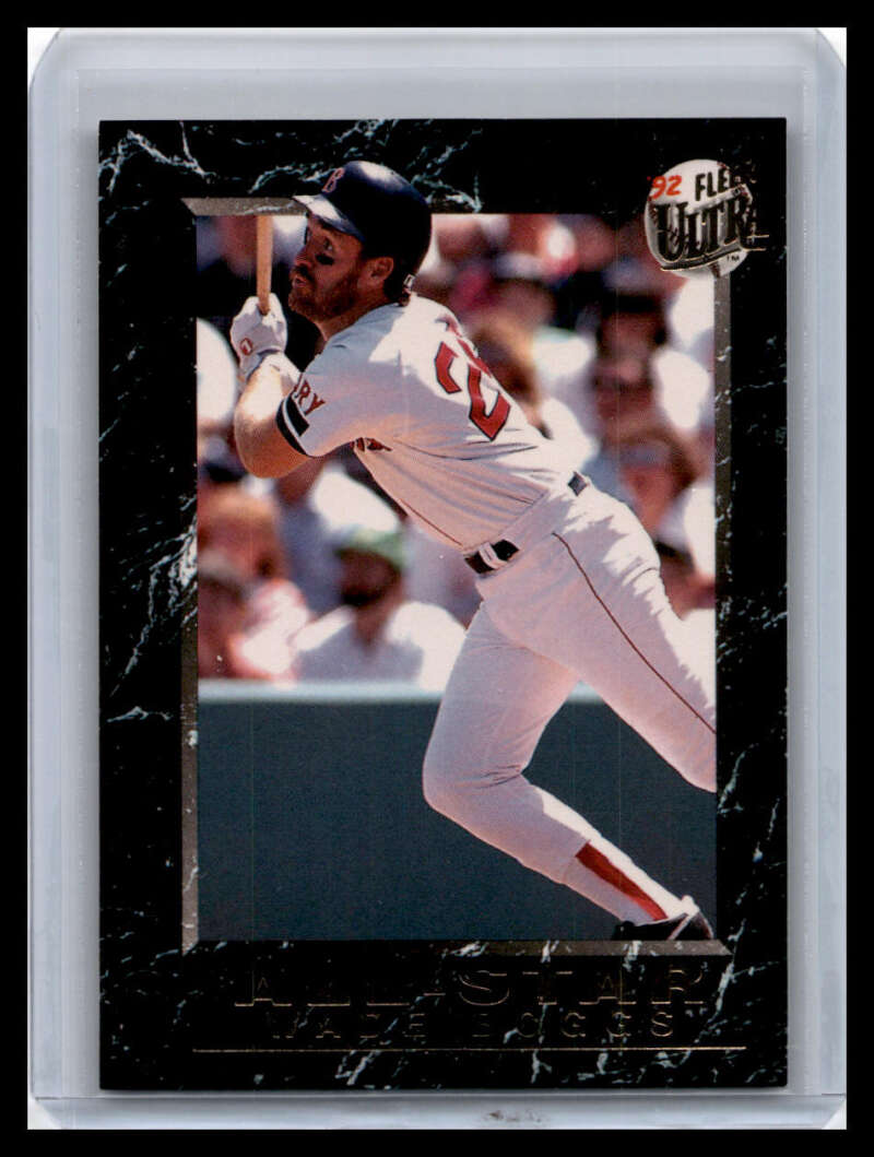 Baseball player in a white uniform swinging bat for Boston Red Sox card