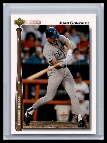 Juan Gonzalez swinging bat on 1992 Upper Deck HR19 Texas Rangers Baseball Card