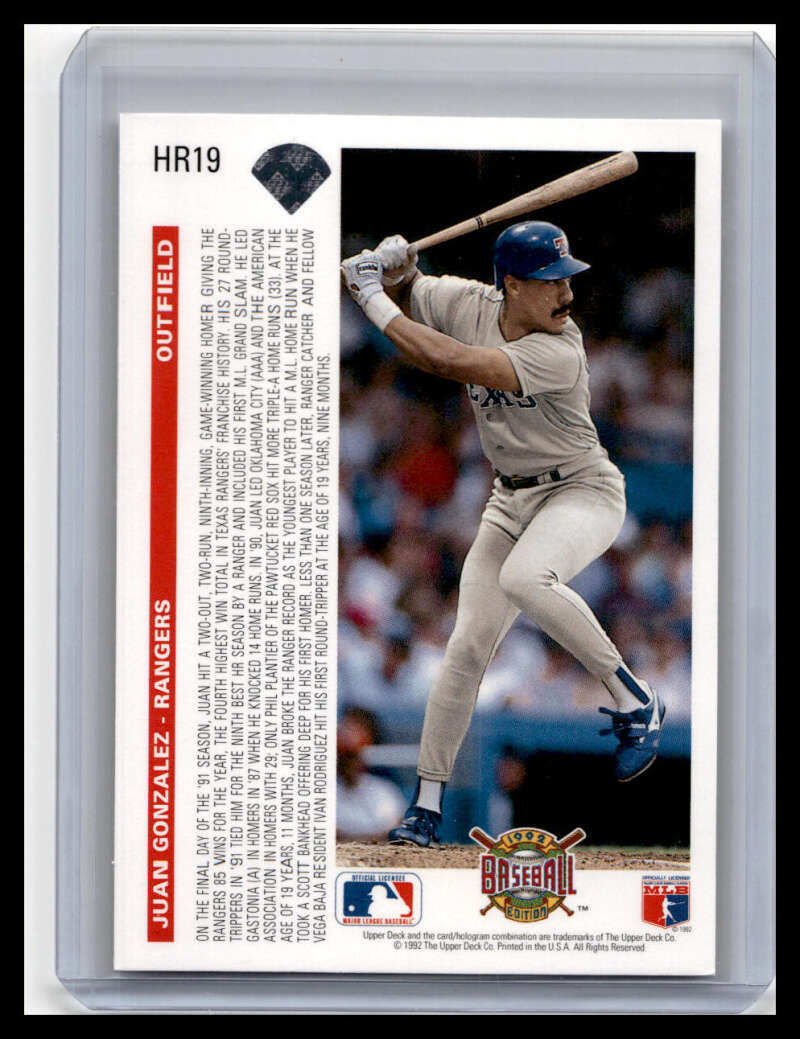 1992 Upper Deck #HR19 Juan Gonzalez card featuring a batter in gray uniform and blue helmet