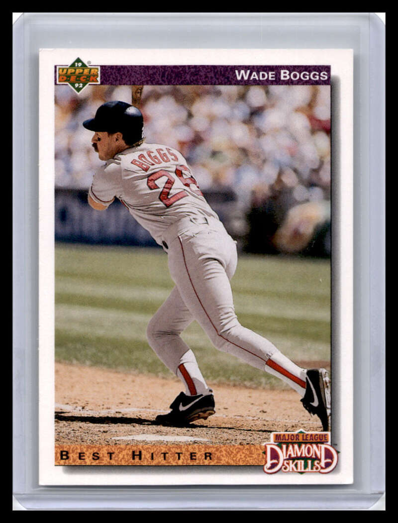 Baseball card of Wade Boggs in white Red Sox uniform at bat, 1992 Upper Deck #646