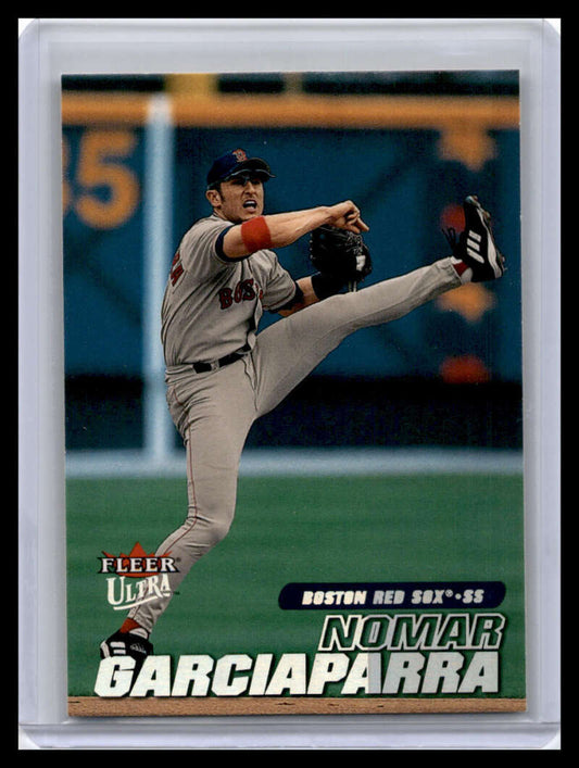 Baseball card of Nomar Garciaparra delivering a pitch for the Red Sox