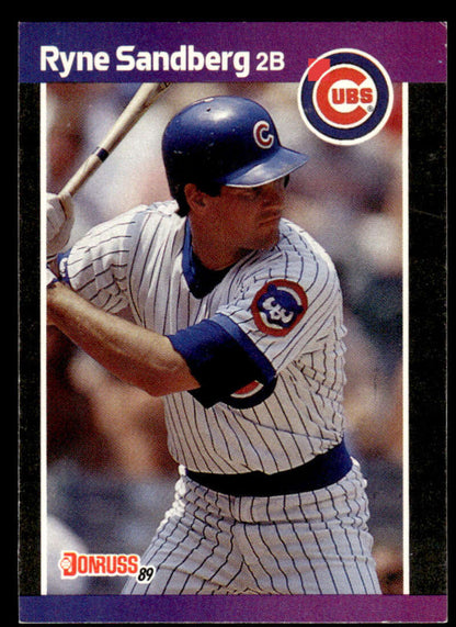 Baseball card of Ryne Sandberg in Chicago Cubs pinstriped uniform at bat