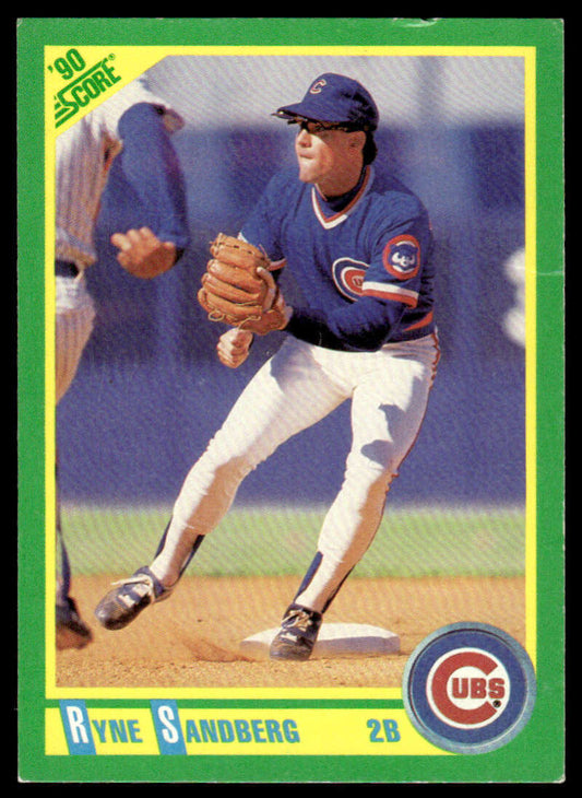 1990 Score Ryne Sandberg baseball card showcasing Chicago Cubs second baseman fielding