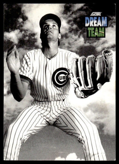 Ryne Sandberg in pinstripe uniform holding glove with cloudy sky for Chicago Cubs baseball card