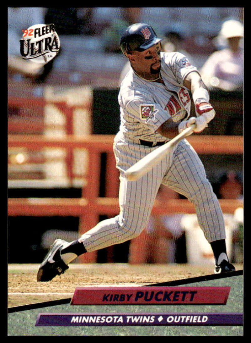 Baseball player in Minnesota Twins uniform batting, showcasing Kirby Puckett’s legacy