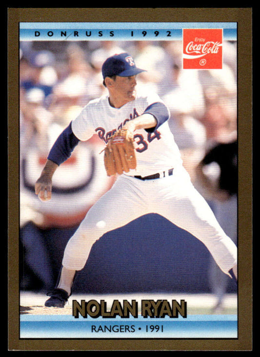 Nolan Ryan mid-throw on a Texas Rangers baseball card in white uniform number 34