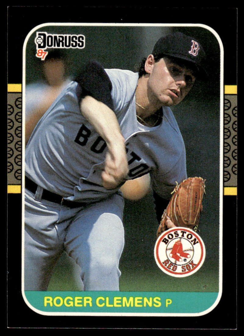 Boston Red Sox Baseball Card of Roger Clemens in mid-throw wearing gray uniform