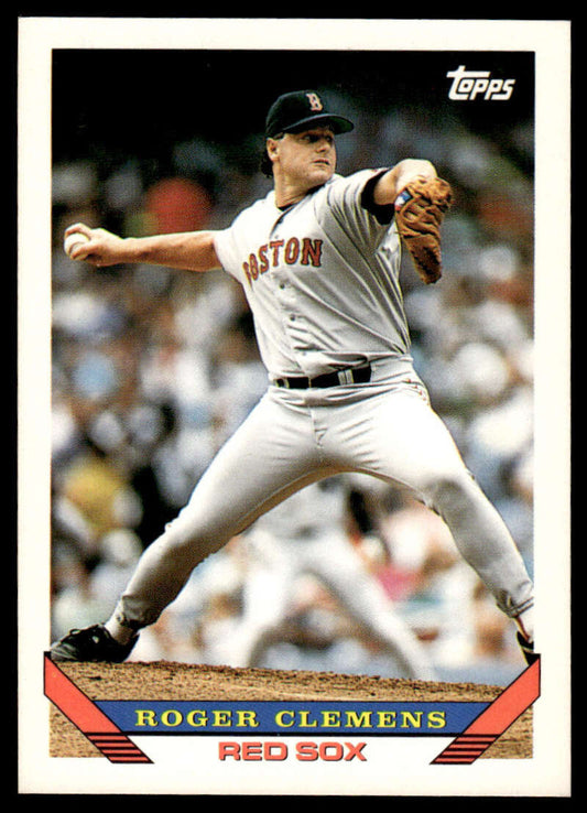 Baseball player Roger Clemens in Boston Red Sox uniform mid-pitch delivery on baseball card