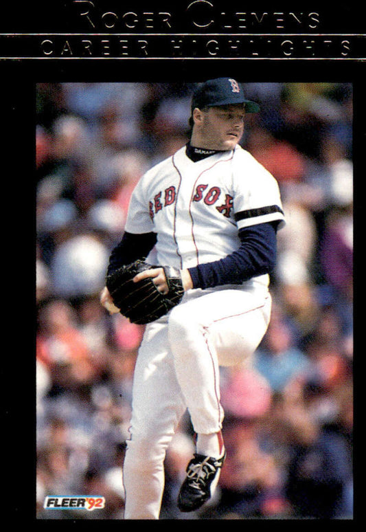 Baseball player Roger Clemens in Boston Red Sox uniform mid-pitch