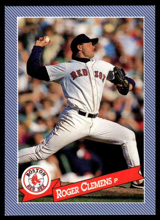 Boston Red Sox Baseball Card of Roger Clemens in white home uniform mid-throw