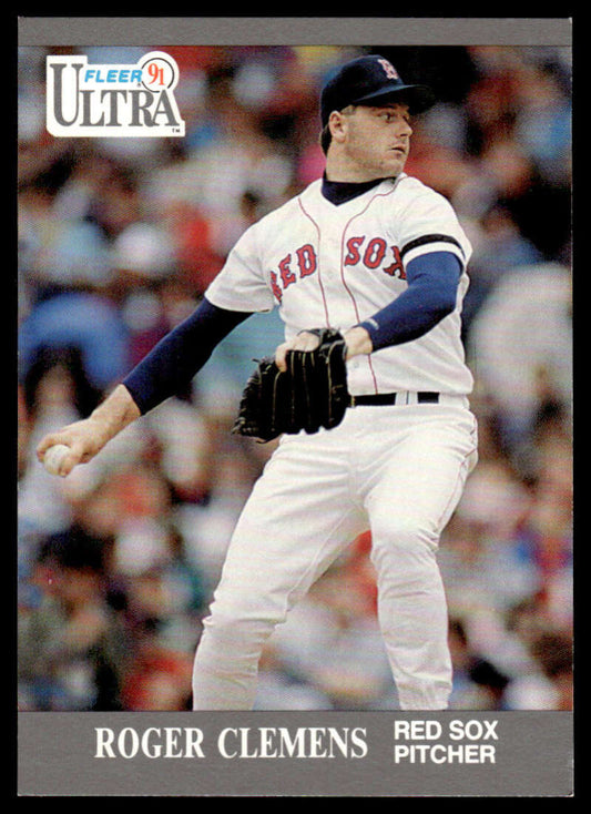 Baseball card of Roger Clemens pitching for the Red Sox in a white home uniform