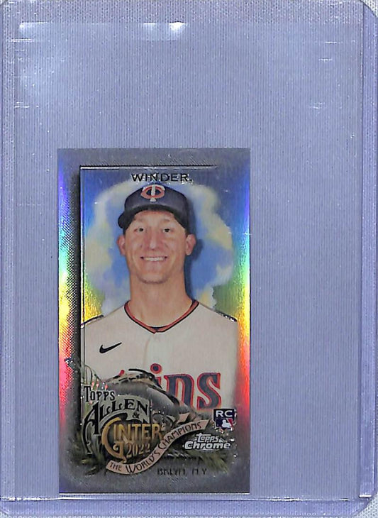 Holographic Chrome Mini Refractor of Josh Winder displayed upside down in a case