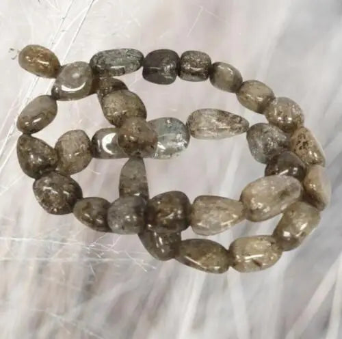 Strand of polished Labradorite beads in original gloss with Ice Flake Quartz grey nuggets