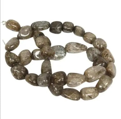 Strand of tumbled Smoky Quartz beads in Ice Flake Quartz Grey Nuggets with original gloss