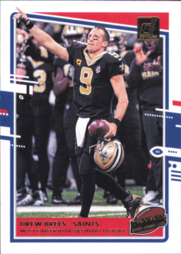 Football player in black New Orleans Saints uniform celebrating, Donruss Highlights Drew Brees