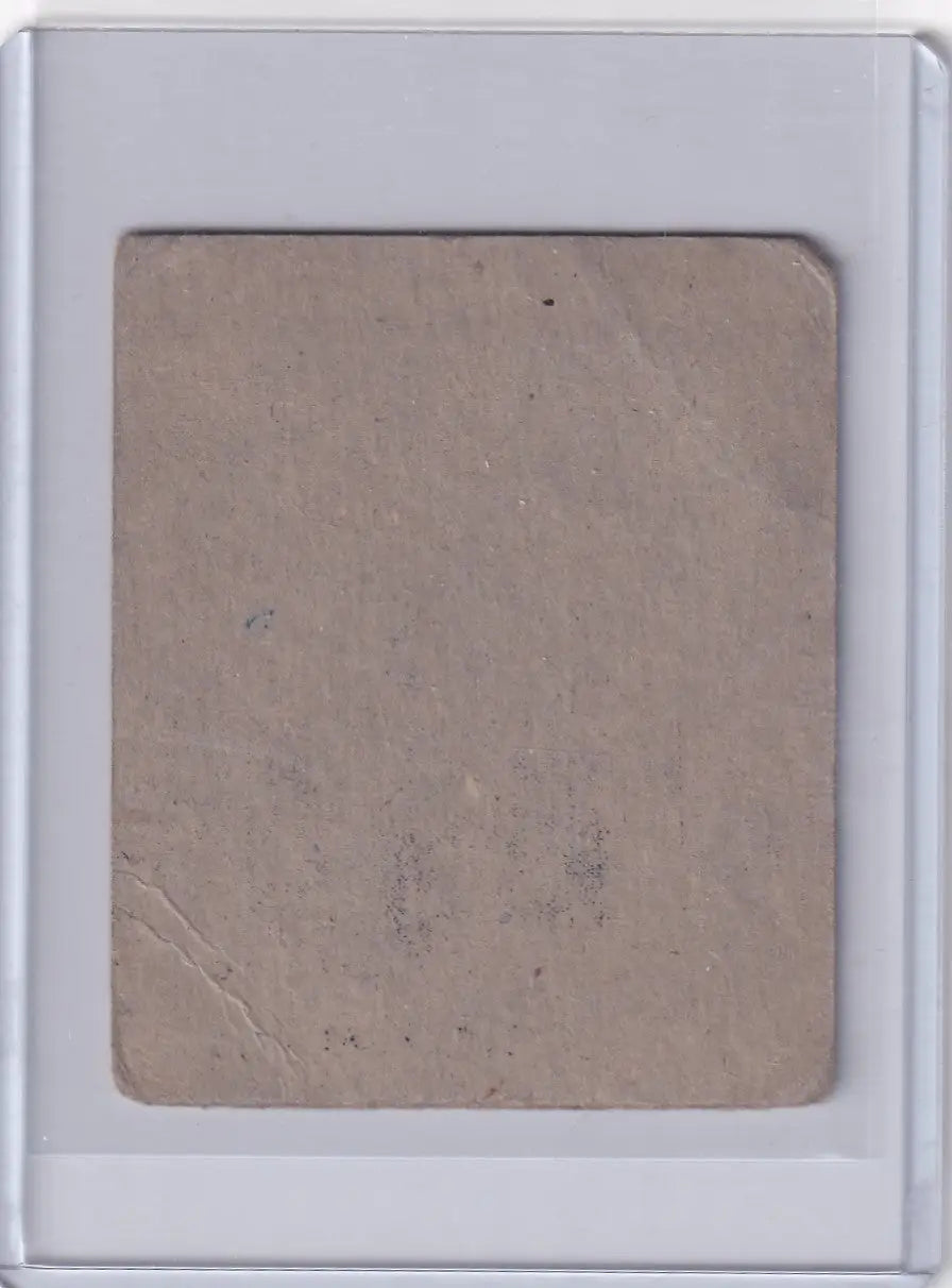 Plain beige cardboard square with wear, part of 1948 R346 Blue Tint #25 Gus Niarhos