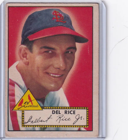 Baseball card of Del Rice in St Louis Cardinals cap on red background, Topps Baseball