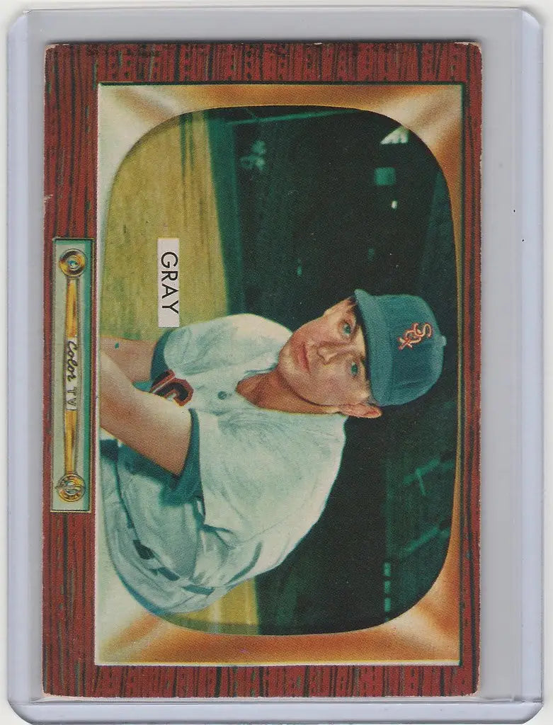 Baseball card of Ted Grey, Chicago White Sox player in light blue uniform swinging bat