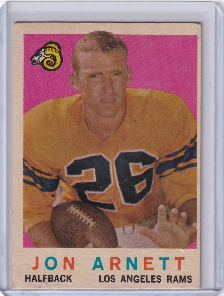 Vintage Topps Football card of Jon Arnett, Los Angeles Rams, in yellow jersey 26