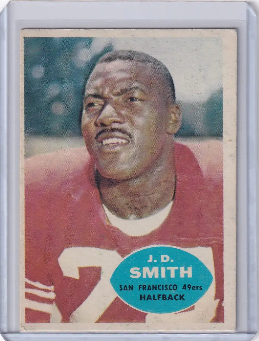 Vintage Topps Football trading card of San Francisco 49ers halfback in red jersey