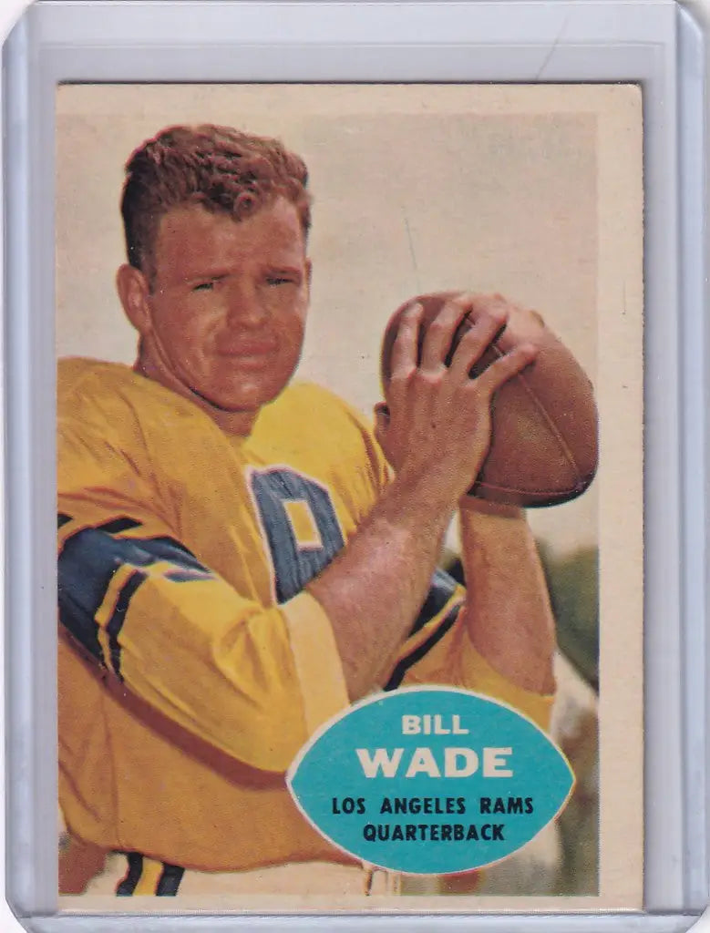 Vintage Topps Football card of Bill Wade, Los Angeles Rams quarterback in yellow jersey