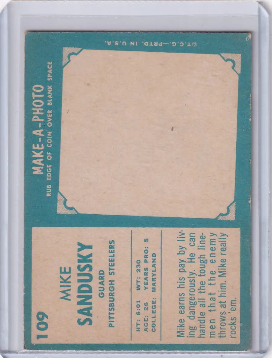 Vintage turquoise Topps Football card back of Mike Sandusky from Pittsburgh Steelers