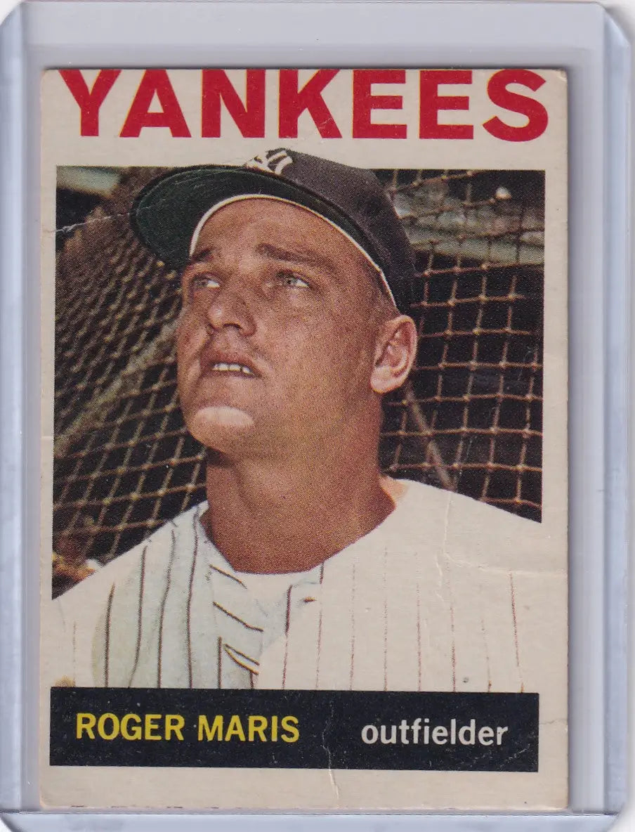 1964 Topps Baseball card of Roger Maris, New York Yankees outfielder in pinstripes