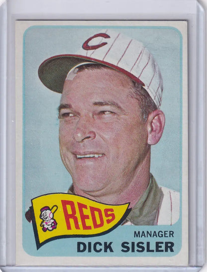 Topps Baseball card of Dick Sisler in Cincinnati Reds cap and uniform smiling