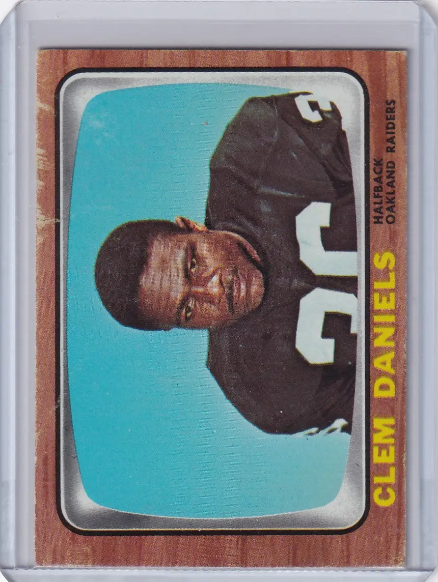 Vintage 1966 Topps Football #107 Clem Daniels card featuring Oakland Raiders design