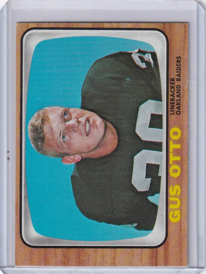 Vintage Topps Football card of Gus Otto in dark jersey for Oakland Raiders