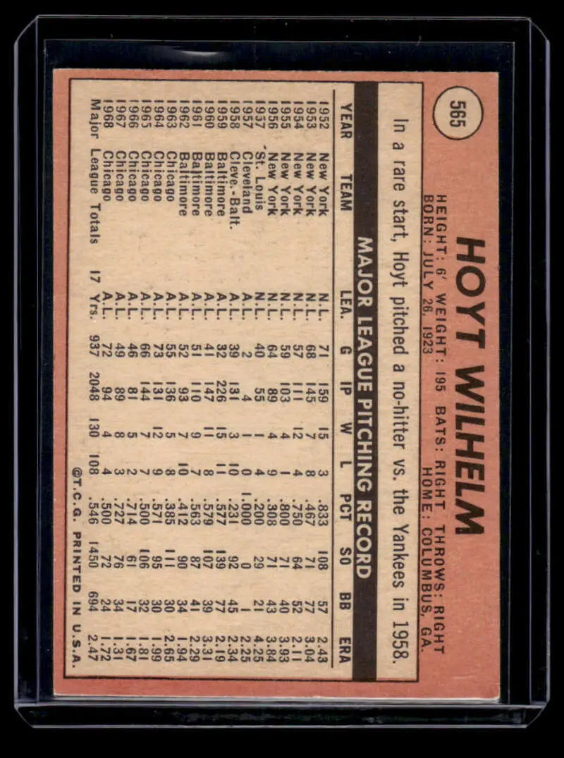 Hoyt Wilhelm 1969 Topps #565 Baseball Card with Statistics on Pink Background