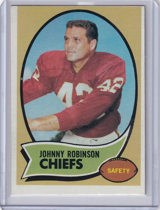 Vintage Topps Football card of Johnny Robinson, Kansas City Chiefs safety in red uniform