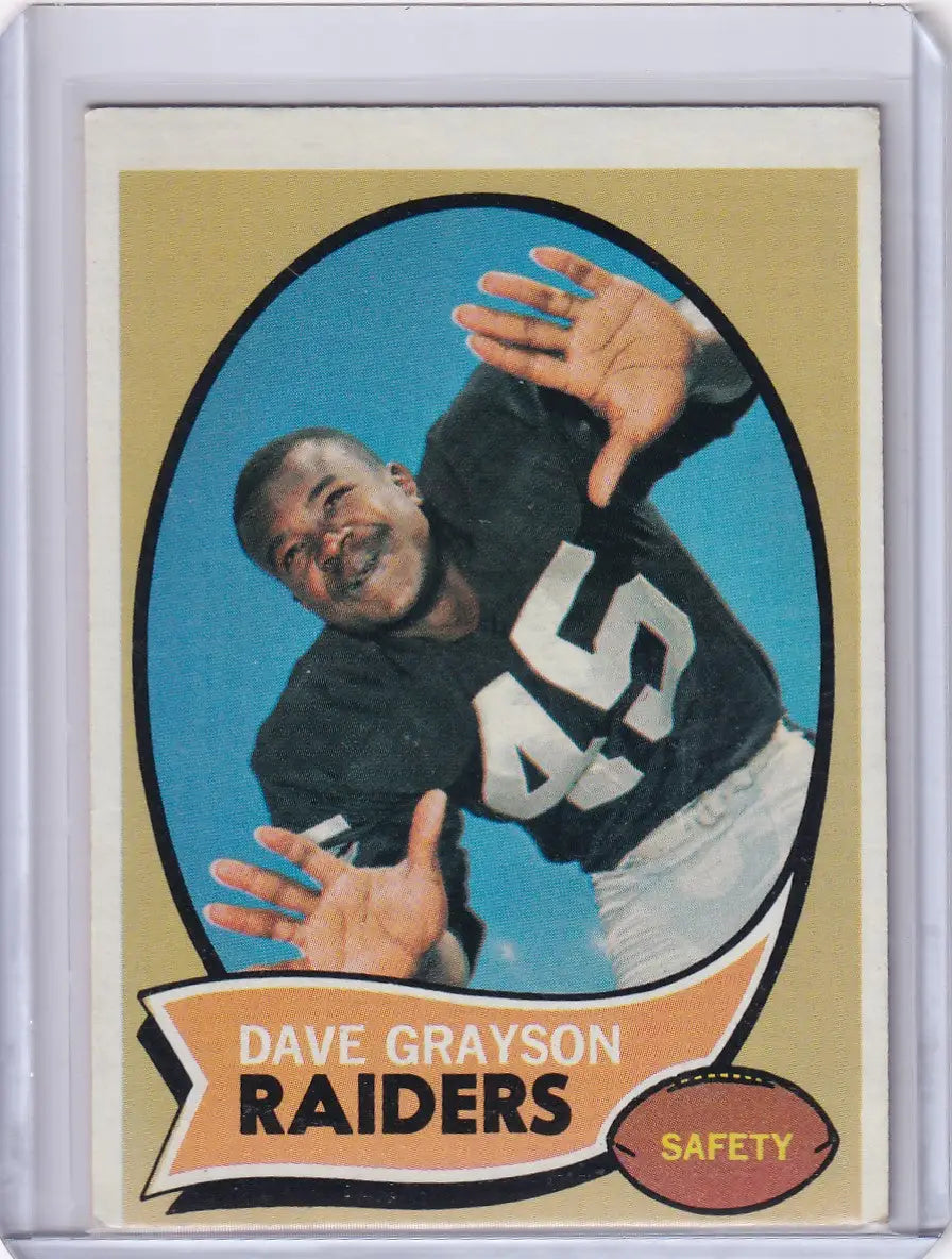 Vintage Topps Football card of Dave Grayson in catching pose for Oakland Raiders