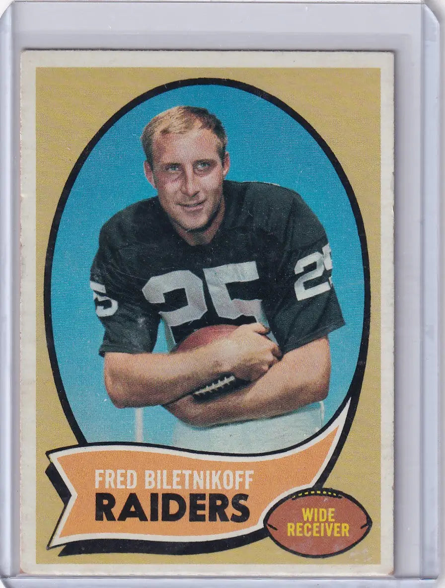 Vintage Topps Football card of Fred Biletnikoff in dark Oakland Raiders jersey