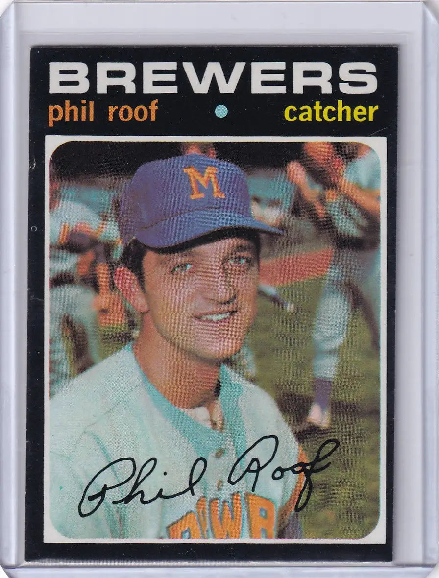 Baseball card of Phil Roof smiling in a blue cap for Topps Baseball, Milwaukee Brewers