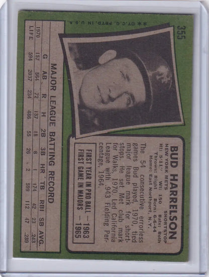 Topps Baseball card of Bud Harrelson with stats on a green background for New York Mets