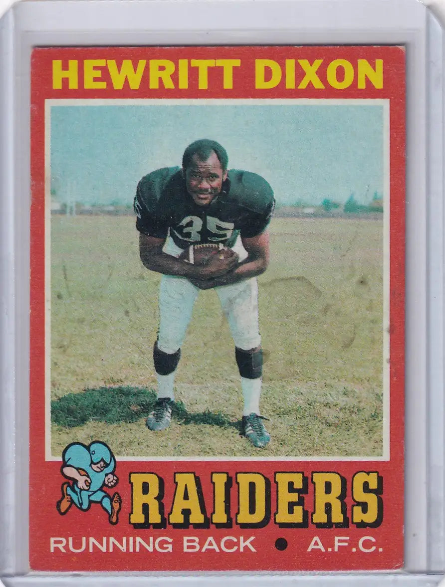 Topps Football card of Hewritt Dixon in playing stance for Oakland Raiders on field