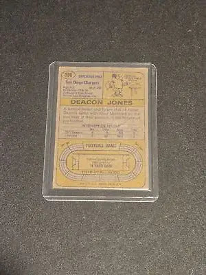 Encased vintage 1974 Topps #390 Deacon Jones football card from San Diego Chargers