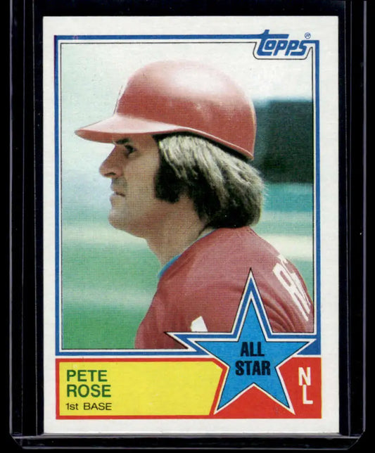 1983 Topps baseball card of Pete Rose in profile with Cincinnati Reds helmet