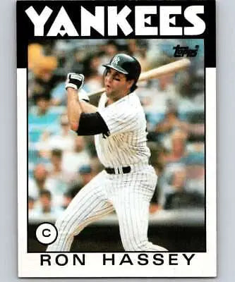 1986 Topps #157 Ron Hassey NM card showcasing original gloss and Yankees history