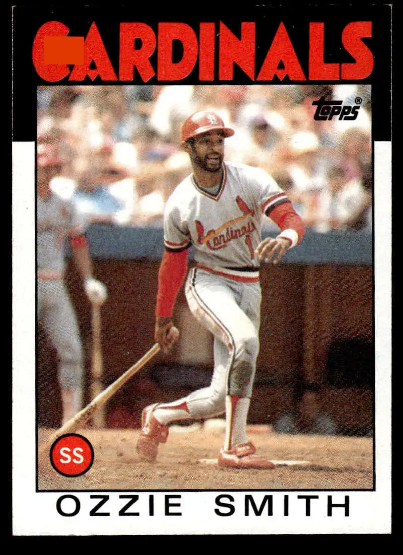 1986 Topps #730 Ozzie Smith baseball card showcasing St. Louis Cardinals history