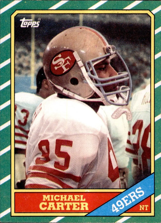 1986 Topps Michael Carter San Francisco 49ers #165 football card in EX condition