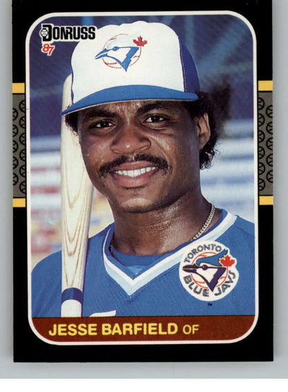 1987 Donruss Jesse Barfield baseball card featuring Toronto Blue Jays classic uniform