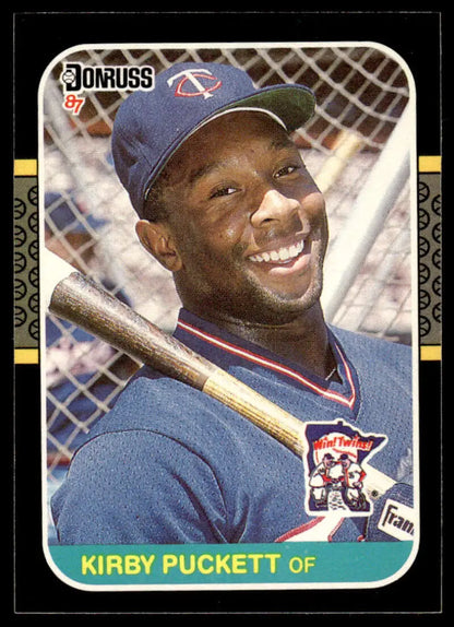 1987 Donruss Kirby Puckett baseball card featuring Minnesota Twins outfielder in batting pose