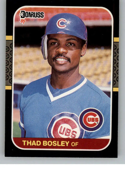 1987 Donruss Thad Bosley baseball card featuring Chicago Cubs outfielder in blue uniform