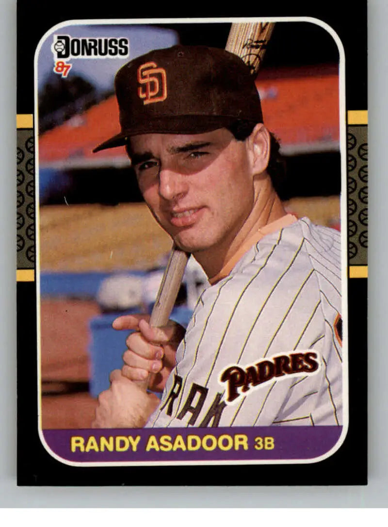 Baseball card of San Diego Padres player in pinstripe uniform and team cap