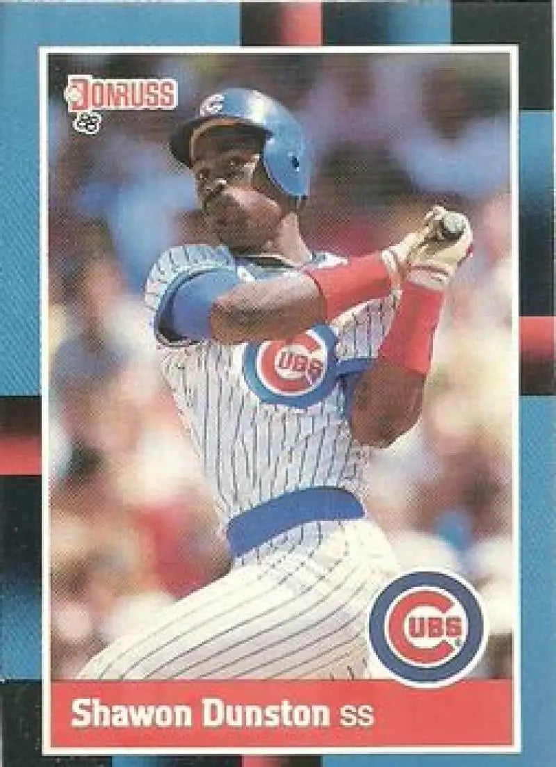 1988 Donruss Shawon Dunston baseball card featuring a Chicago Cubs player mid-swing