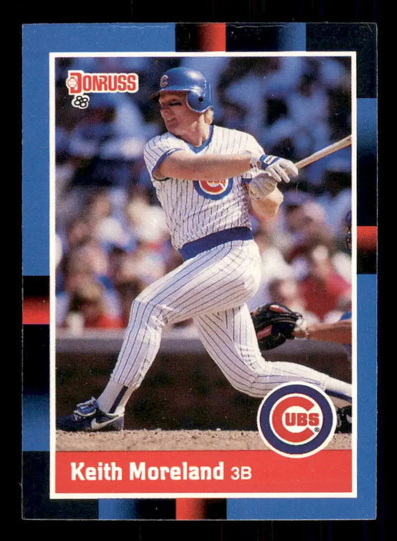 1988 Donruss #201 Keith Moreland Cubs baseball card mid-swing in pinstriped uniform