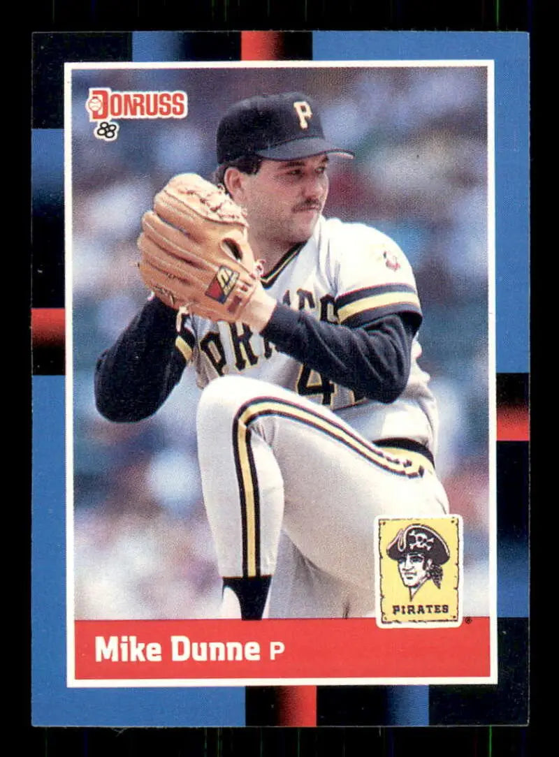 1988 Donruss #390 Mike Dunne baseball card featuring Pittsburgh Pirates pitcher mid-windup