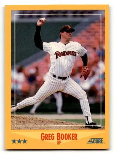 Baseball card of Greg Booker San Diego in pinstriped uniform mid-throwing motion